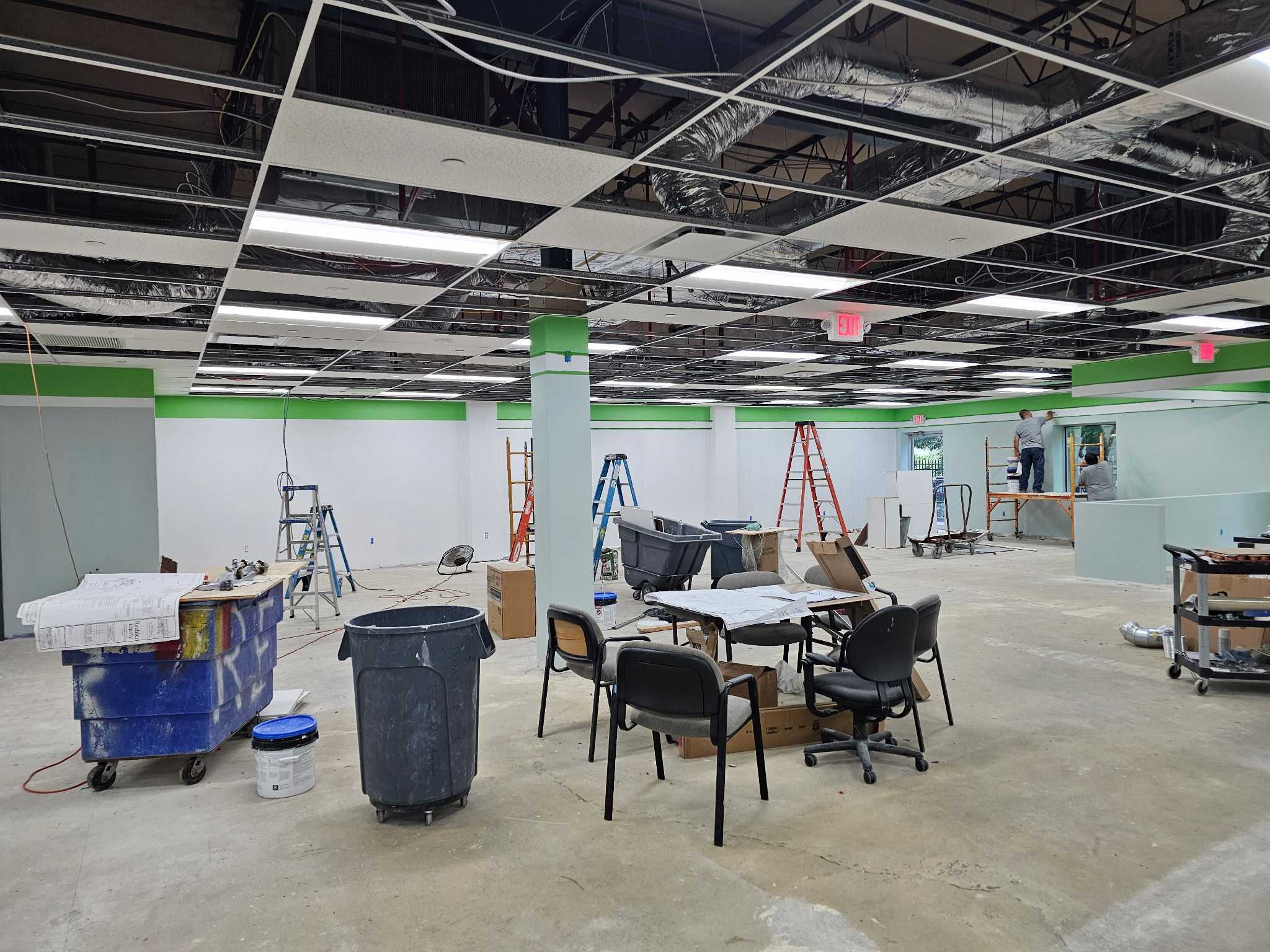 Commercial space under renovation with fresh paint