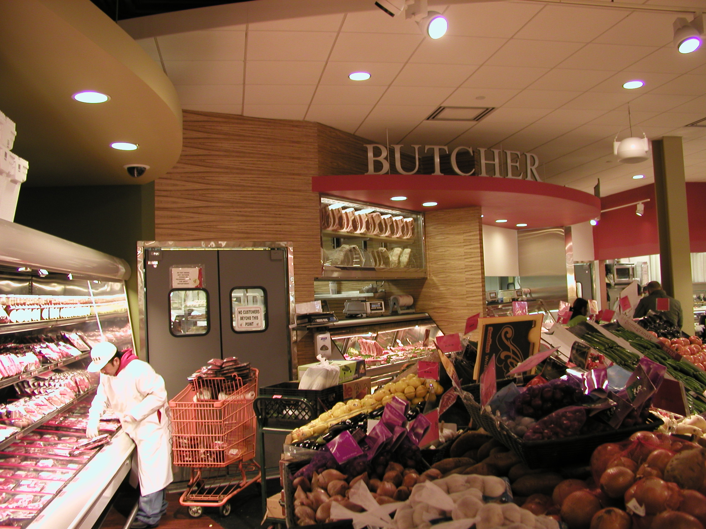 Grocery store butcher section with specialty finishes